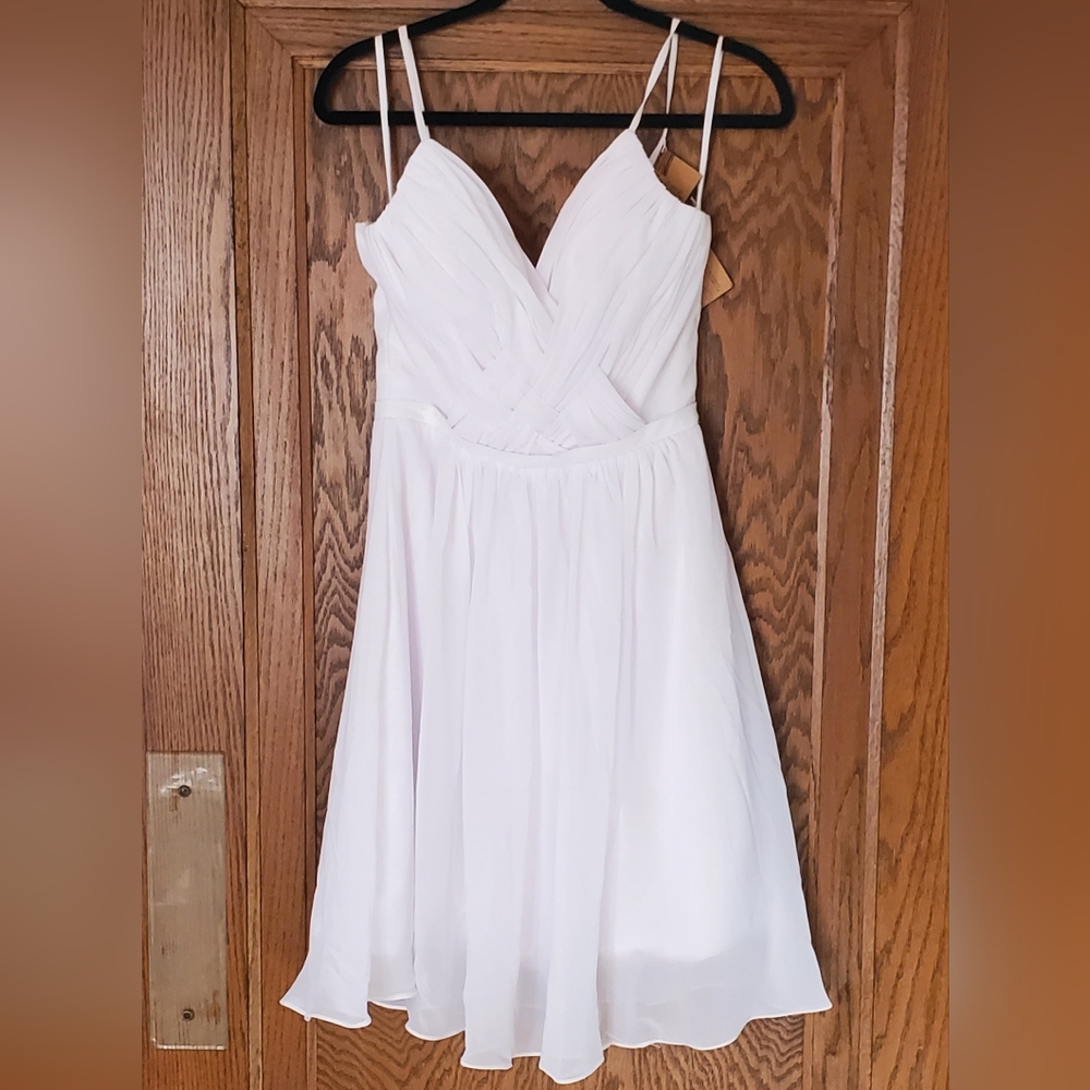 Short White Dress! Beautiful! It did not fit me so reposhing